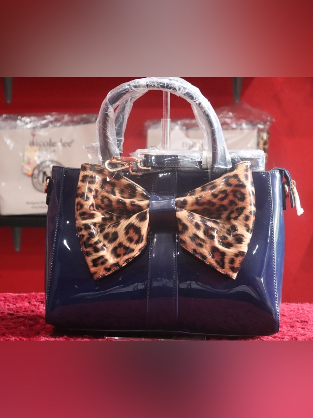 Patent Navy Handbag with Leopard Bow Accent